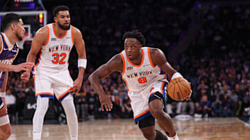 Apr 6, 2025; New York, New York, USA; New York Knicks forward OG Anunoby (8) dribbles during the second half against the Phoenix Suns at Madison Square Garden. Mandatory Credit: Vincent Carchietta-Imagn Images