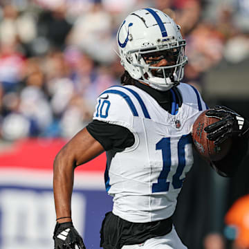 Indianapolis Colts wide receiver Adonai Mitchell (10) gains yards after catch during the first half against the New York Giants at MetLife Stadium.