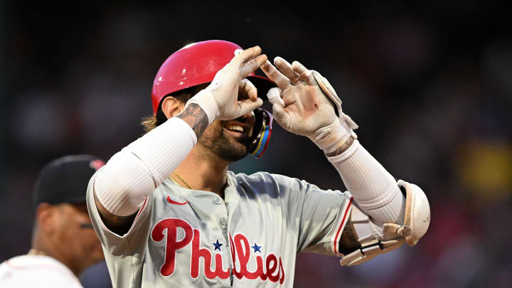 Jun 12, 2024; Boston, Massachusetts, USA; Philadelphia Phillies outfielder Nick Castellanos (8) reacts after hitting a triple against the Boston Red Sox during the fourth inning at Fenway Park. Mandatory Credit: Brian Fluharty-USA TODAY Sports