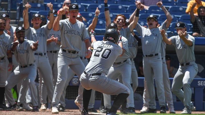 South Carolina baseball star Ethan Petry celebrating with his teammates after hitting a home run last season