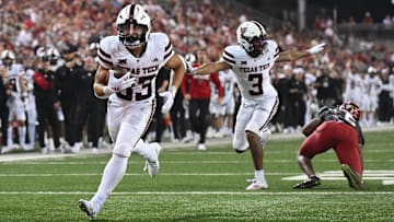 Sep 7, 2024; Pullman, Washington, USA; Texas Tech Red Raiders running back Cameron Dickey (33) scores a touchdown against the Washington State Cougars in the second half at Gesa Field at Martin Stadium. Washington State Cougars won 37-16. Mandatory Credit: James Snook-Imagn Images