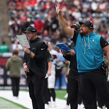 Nov 9, 2025; Houston, Texas, USA; Jacksonville Jaguars head coach Liam Coen calls a play from the sidelines against the Houston Texans during the first half at NRG Stadium. Mandatory Credit: Thomas Shea-Imagn Images