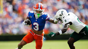 Sep 6, 2025; Gainesville, Florida, USA; Florida Gators wide receiver Eugene Wilson III (3) runs against South Florida Bulls cornerback Jarvis Lee (0) during the first half at Ben Hill Griffin Stadium. Mandatory Credit: Matt Pendleton-Imagn Images