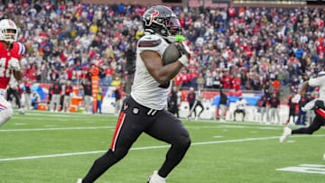 Oct 13, 2024; Foxborough, Massachusetts, USA; Houston Texans running back Dameon Pierce (31) runs with the ball for a touchdown against the New England Patriots during the second half at Gillette Stadium. Mandatory Credit: Gregory Fisher-Imagn Images