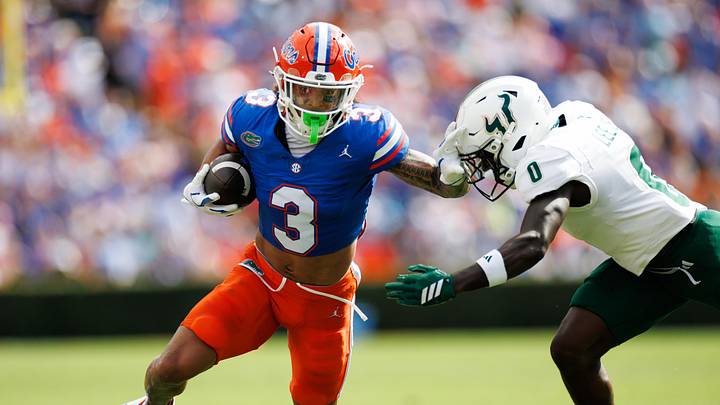 Sep 6, 2025; Gainesville, Florida, USA; Florida Gators wide receiver Eugene Wilson III (3) runs against South Florida Bulls cornerback Jarvis Lee (0) during the first half at Ben Hill Griffin Stadium. Mandatory Credit: Matt Pendleton-Imagn Images