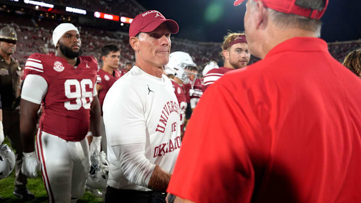 Oklahoma coach Brent Venables talks with Houston coach Willie Fritz after a college football game between the University of Oklahoma Sooners (OU) and the Houston Cougars at Gaylord Family – Oklahoma Memorial Stadium in Norman, Okla., Saturday, Sept. 7, 2024.