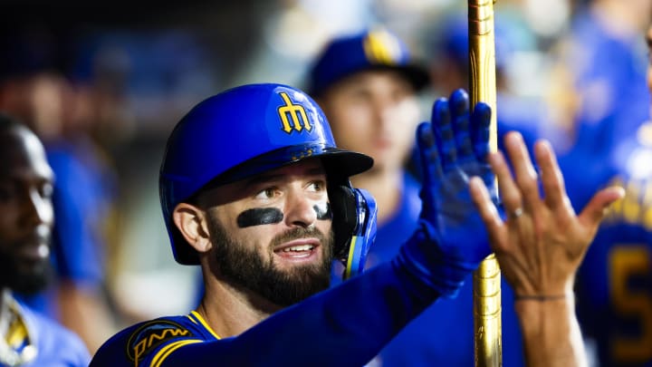 Seattle Mariners right fielder Mitch Haniger (17) celebrates in the dugout after hitting a solo-home run against the Philadelphia Phillies during the seventh inning at T-Mobile Park on Aug 2.