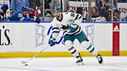 Mar 30, 2024; St. Louis, Missouri, USA;  San Jose Sharks right wing Justin Bailey (90) controls the puck against the St. Louis Blues during the third period at Enterprise Center. Mandatory Credit: Jeff Curry-Imagn Images