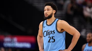Apr 5, 2025; Inglewood, California, USA;  Los Angeles Clippers guard Ben Simmons (25) looks on during the first half against the Dallas Mavericks at Intuit Dome. Mandatory Credit: Kiyoshi Mio-Imagn Images