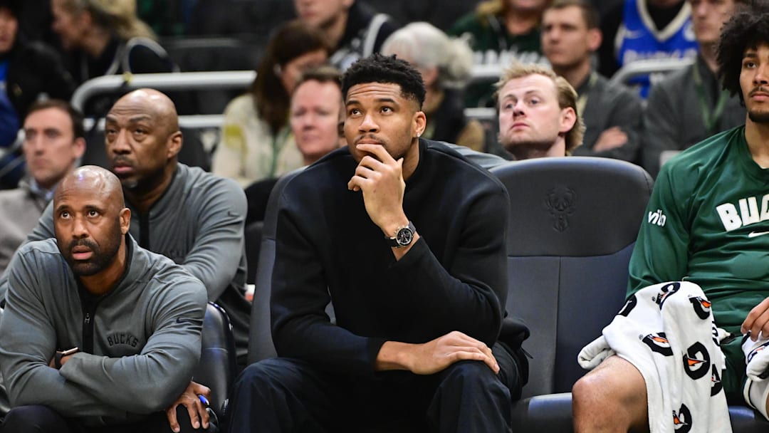 Dec 11, 2025; Milwaukee, Wisconsin, USA; Milwaukee Bucks forward Giannis Antetokounmpo (34) looks on from the bench while recovering from an injury in the second quarter against the Boston Celtics at Fiserv Forum. Mandatory Credit: Benny Sieu-Imagn Images