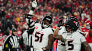 Dec 7, 2025; Kansas City, Missouri, USA; Houston Texans defensive end Will Anderson Jr. (51) and Houston Texans safety Jalen Pitre (5) celebrate after sacking Kansas City Chiefs quarterback Patrick Mahomes (15) during the first quarter at GEHA Field at Arrowhead Stadium. Mandatory Credit: Denny Medley-Imagn Images