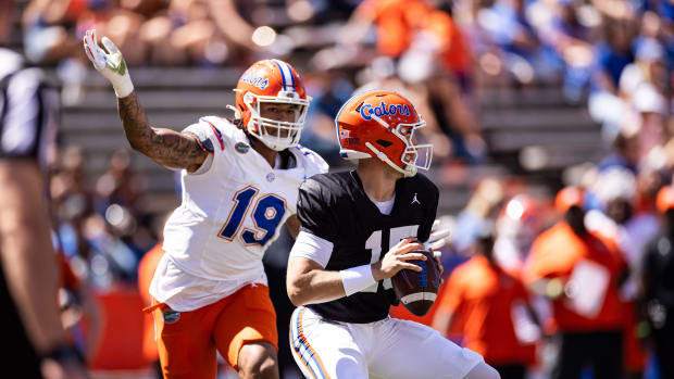 Florida Gators edge rusher T.J. Searcy (19) sacks Florida Gators quarterback Graham Mertz (15) during the second half at the 