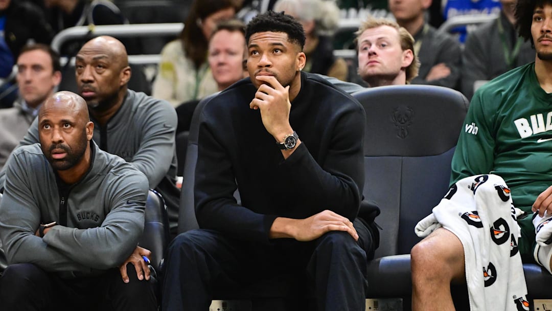 Dec 11, 2025; Milwaukee, Wisconsin, USA; Milwaukee Bucks forward Giannis Antetokounmpo (34) looks on from the bench while recovering from an injury in the second quarter against the Boston Celtics at Fiserv Forum. Mandatory Credit: Benny Sieu-Imagn Images