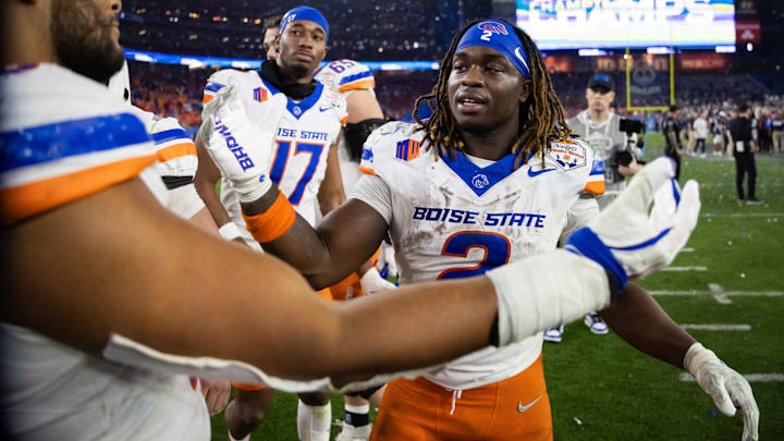 Dec 31, 2024; Glendale, AZ, USA; Boise State Broncos running back Ashton Jeanty (2) greets teammates following the game against the Penn State Nittany Lions during the Fiesta Bowl at State Farm Stadium. Mandatory Credit: Mark J. Rebilas-Imagn Images Dec 31, 2024; Glendale, AZ, USA; Boise State Broncos running back Ashton Jeanty (2) greets teammates following the game against the Penn State Nittany Lions during the Fiesta Bowl at State Farm Stadium. Mandatory Credit: Mark J. Rebilas-Imagn Images