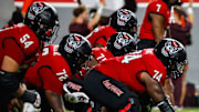 Sep 27, 2025; Raleigh, North Carolina, USA;  North Carolina State Wolfpack offensive lineman Jalen Grant (74) with the ball during the first half of the game against Virginia Tech Hokies at Carter-Finley Stadium. Mandatory Credit: Jaylynn Nash-Imagn Images