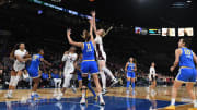 Mar 3, 2023; Las Vegas, NV, USA; Stanford Cardinal forward Cameron Brink (22) puts up a shot over UCLA Bruins forward Emily Bessoir (11) in the fourth quarter at Michelob Arena. Mandatory Credit: Candice Ward-USA TODAY Sports