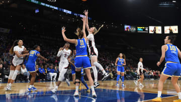 Mar 3, 2023; Las Vegas, NV, USA; Stanford Cardinal forward Cameron Brink (22) puts up a shot over UCLA Bruins forward Emily Bessoir (11) in the fourth quarter at Michelob Arena. Mandatory Credit: Candice Ward-USA TODAY Sports