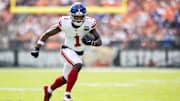 Sep 22, 2024; Cleveland, Ohio, USA; New York Giants wide receiver Malik Nabers (1) runs the ball against the Cleveland Browns during the second quarter at Huntington Bank Field. Mandatory Credit: Scott Galvin-Imagn Images