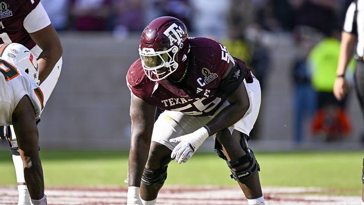 Dec 20, 2025; College Station, TX, USA; Texas A&M Aggies offensive lineman Ar'Maj Reed-Adams (55) lines up during the game between the Aggies and the Hurricanes at Kyle Field. Mandatory Credit: Jerome Miron-Imagn Images