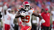 Nov 16, 2025; Denver, Colorado, USA; Kansas City Chiefs running back Kareem Hunt (29) carries the ball in the third quarter against the Denver Broncos at Empower Field at Mile High. Mandatory Credit: Ron Chenoy-Imagn Images
