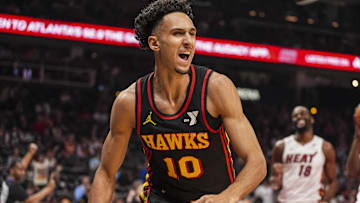 Atlanta Hawks forward Zaccharie Risacher reacts after scoring a basket against the Miami Heat during the first half at State Farm Arena