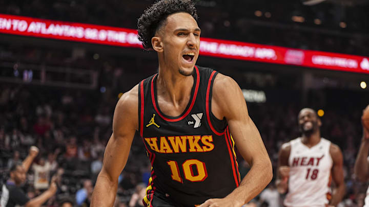 Atlanta Hawks forward Zaccharie Risacher reacts after scoring a basket against the Miami Heat during the first half at State Farm Arena