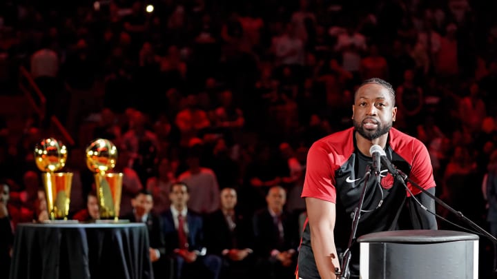 Mar 26, 2019; Miami, FL, USA; Miami Heat guard Dwyane Wade (3) speaks during the jersey retirement of former player Chris Bosh during halftime of the game between the Miami Heat and the Orlando Magic at American Airlines Arena. Mandatory Credit: Jasen Vinlove-USA TODAY Sports