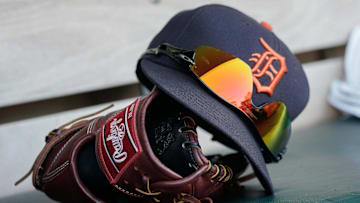Aug 3, 2018; Oakland, CA, USA; General view of the Detroit Tigers baseball cap, sunglasses and glove before the game against the Oakland Athletics at the Oakland Coliseum.