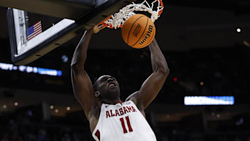 Mar 23, 2025; Cleveland, OH, USA; Alabama Crimson Tide center Clifford Omoruyi (11) dunks in the second half against the St. Mary's Gaels during the NCAA Tournament Second Round at Rocket Arena.