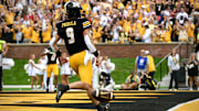 Oct 11, 2025; Columbia, MO; USA; Missouri Tigers quarterback Beau Pribula (9) celebrates after a touchdown in the third quarter against the Alabama Crimson Tide at Faurot Field at Memorial Stadium.