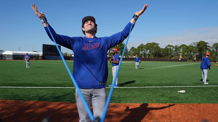 Feb 12, 2026; Port St. Lucie, FL, USA;  New York Mets pitcher Ryan Lambert stretches during spring training. Mandatory Credit: Jim Rassol-Imagn Images