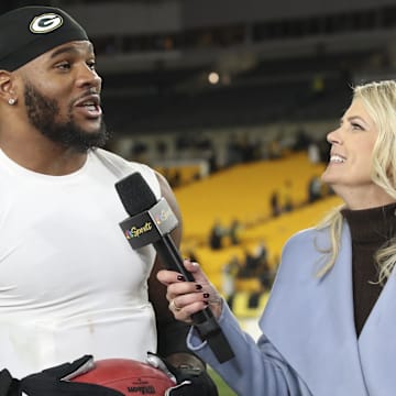 Sideline reporter Melissa Stark interviews Green Bay Packers defensive end Micah Parsons