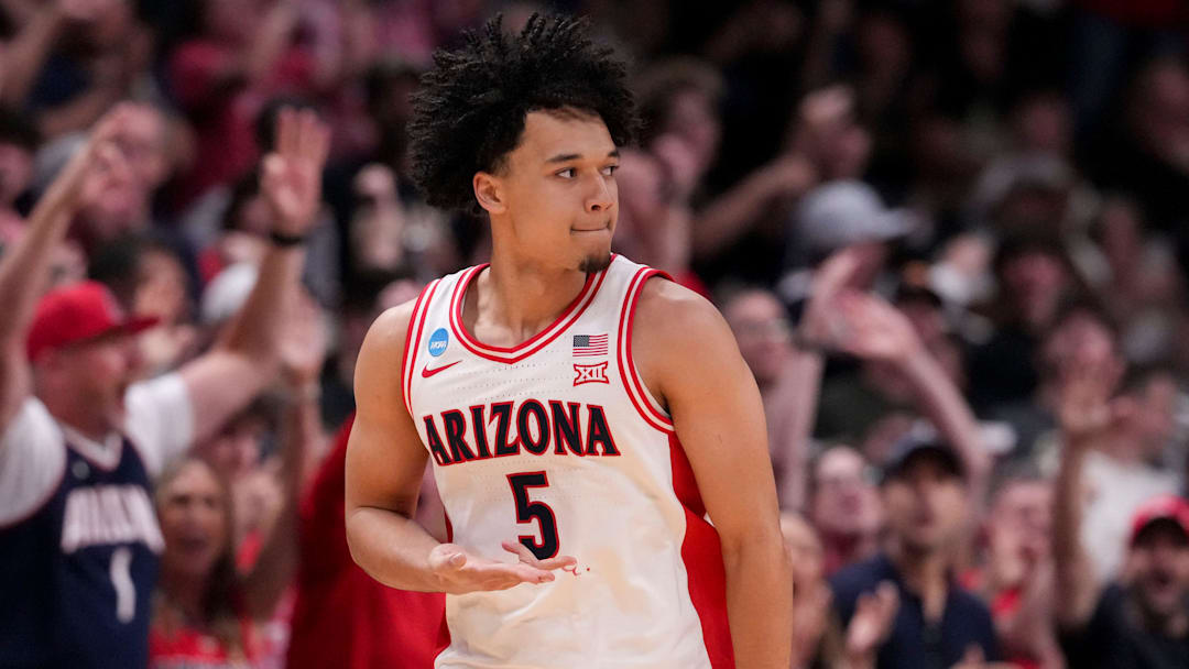 Arizona Wildcats guard Brayden Burries (5) reacts after scoring a three-point field goal against the Purdue Boilermakers during a NCAA Tournament game Saturday, March 28, 2026 at SAP Center in San Jose, Calif. Purdue fell to Arizona 79-64.