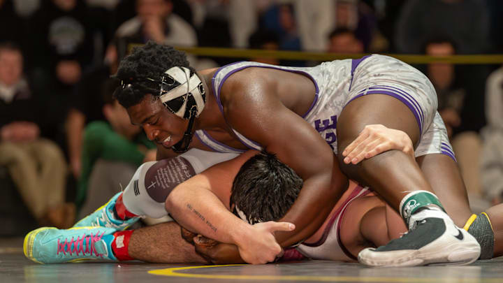 Old Bridge’s Temiloluwa Odumbo beats South River’s Filipe Granadeiro in the varsity wrestling 190 lb. weight class in the 2026 GMC Tournament final on Jan. 24, 2026, afternoon at Piscataway High School in Piscataway.