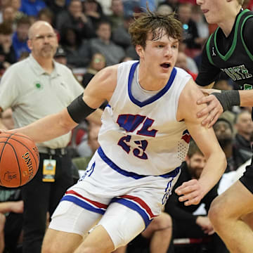 Wisconsin Lutheran's Zavier Zens (23) breaks around Oshkosh North's Bryce Ott (10) in a WIAA Division 1 state semifinal game, Friday, March 21, 2025.