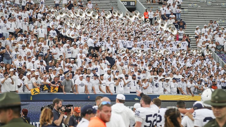 Aug 31, 2024; Morgantown, West Virginia, USA; Penn State Nittany Lions fans celebrate after defeating the West Virginia Mountaineers at Mountaineer Field at Milan Puskar Stadium. Mandatory Credit: Ben Queen-USA TODAY Sports