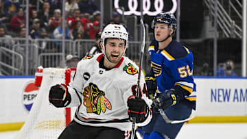 Apr 10, 2024; St. Louis, Missouri, USA;  Chicago Blackhawks left wing Landon Slaggert (84) reacts after scoring his first career NHL goal during the third period against the St. Louis Blues at Enterprise Center. Mandatory Credit: Jeff Curry-Imagn Images