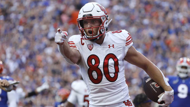 Utah Utes tight end Brant Kuithe celebrates a touchdown during a college football game in the Big 12.
