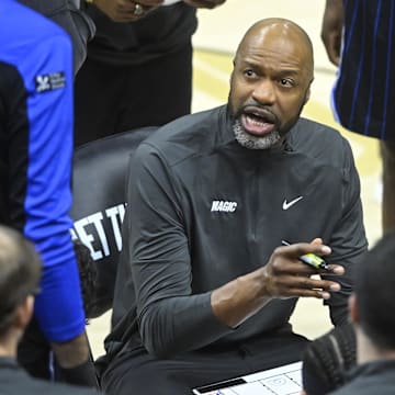 Orlando Magic head coach Jamahl Mosley talks to his team during a timeout in the third quarter against the Cleveland Cavaliers at Rocket Arena.