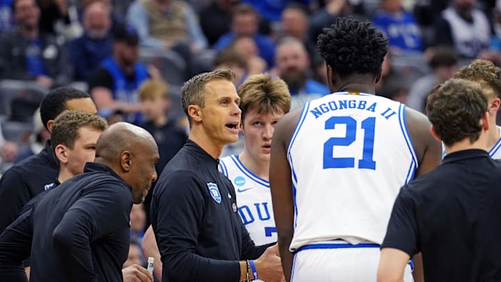 Mar 27, 2025; Newark, NJ, USA; Duke basketball head coach Jon Scheyer talks to his team during the second half against the Arizona Wildcats during an East Regional semifinal of the 2025 NCAA tournament at Prudential Center.