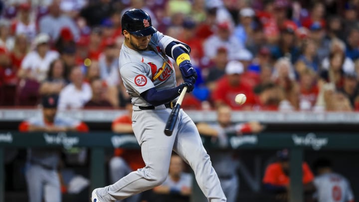 Aug 14, 2024; Cincinnati, Ohio, USA; St. Louis Cardinals catcher Willson Contreras (40) hits a single against the Cincinnati Reds in the sixth inning at Great American Ball Park. Mandatory Credit: Katie Stratman-USA TODAY Sports