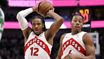 Oct 26, 2025; Dallas, Texas, USA; Toronto Raptors forward Collin Murray-Boyles (12) looks to pass the ball during the second quarter against the Dallas Mavericks at the American Airlines Center. Mandatory Credit: Jerome Miron-Imagn Images