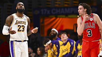 Mar 22, 2025; Los Angeles, California, USA; Los Angeles Lakers forward LeBron James (23) reacts to a foul call against Chicago Bulls guard Josh Giddey (3) during the first half at Crypto.com Arena. Mandatory Credit: Jonathan Hui-Imagn Images