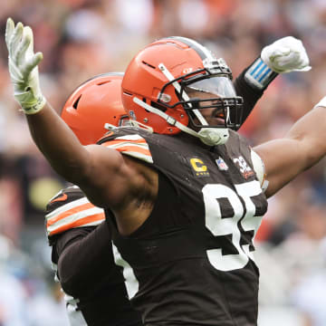 Sep 24, 2023; Cleveland, Ohio, USA; Cleveland Browns defensive end Myles Garrett (95) celebrates after sacking Tennessee Titans quarterback Ryan Tannehill (not pictured) during the second half at Cleveland Browns Stadium.