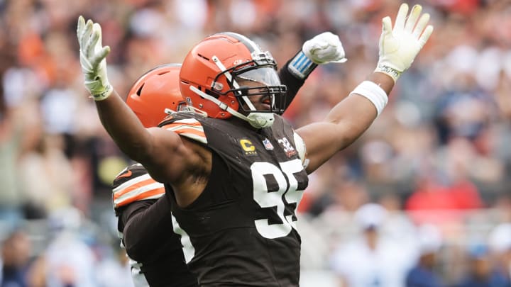 Sep 24, 2023; Cleveland, Ohio, USA; Cleveland Browns defensive end Myles Garrett (95) celebrates after sacking Tennessee Titans quarterback Ryan Tannehill (not pictured) during the second half at Cleveland Browns Stadium.