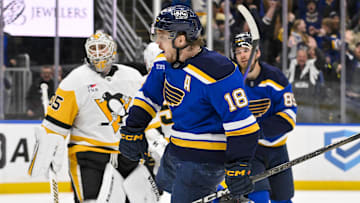 Apr 3, 2025; St. Louis, Missouri, USA;  St. Louis Blues center Robert Thomas (18) reacts after scoring the game winning goal against Pittsburgh Penguins goaltender Tristan Jarry (35) during overtime at Enterprise Center. Mandatory Credit: Jeff Curry-Imagn Images