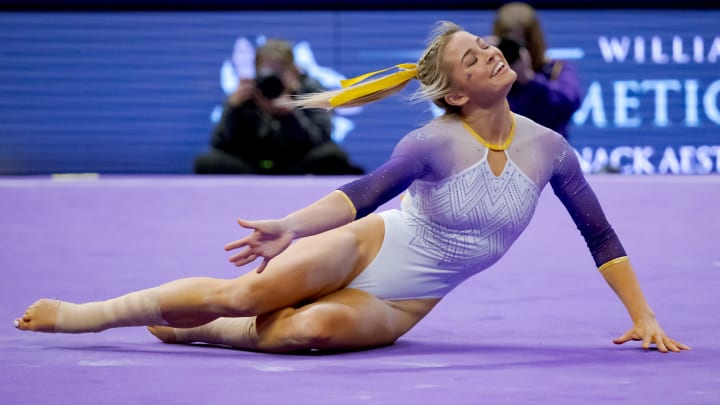 Feb 2, 2024; Baton Rouge, LA, USA;  LSU Lady Tigers senior Olivia \"Livvy\" Dunne performs a floor routine against the Arkansas Razorbacks at Pete Maravich Assembly Center. 