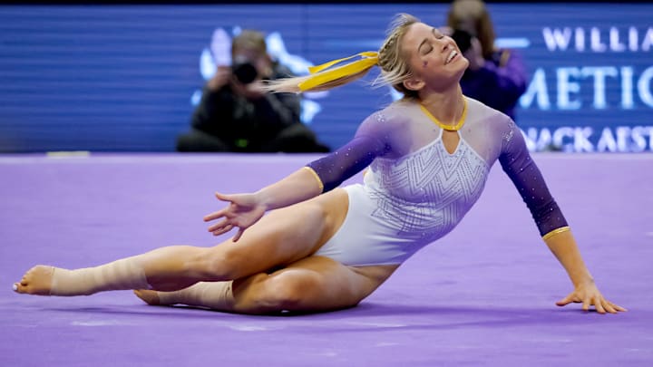 LSU Lady Tigers senior Livvy Dunne does a floor routine against the Arkansas Razorbacks at Pete Maravich Assembly Center. LSU Lady Tigers senior Livvy Dunne does a floor routine against the Arkansas Razorbacks at Pete Maravich Assembly Center.