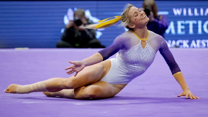 Feb 2, 2024; Baton Rouge, LA, USA;  LSU Lady Tigers senior Olivia \"Livvy\" Dunne performs a floor routine against the Arkansas Razorbacks at Pete Maravich Assembly Center. 