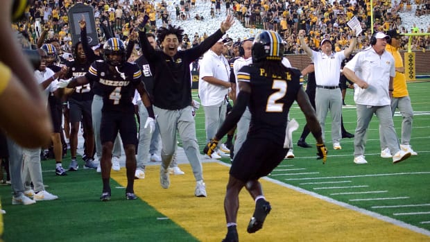 Missouri Tigers cornerback Toriano Pride Jr. (2) celebrates on the sideline after scoring a pick-six against Murray State.